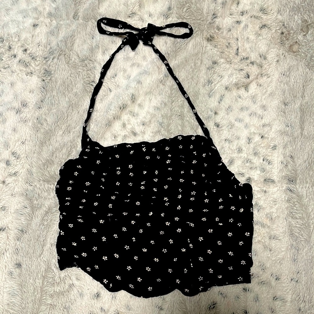 A cropped shirt. No straps only strings